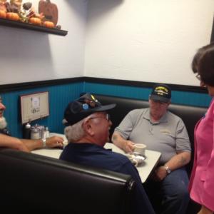 Annie speaking with voters at Suzie's diner in Hudson