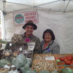 Annie speaking with local farmer at Warner Fall Foliage Festival 