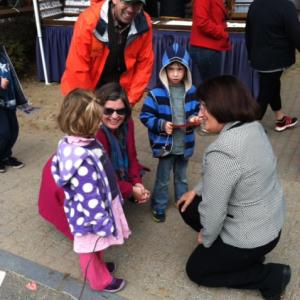 Annie talking with young supporters at the Warner Fall Foliage Festival 