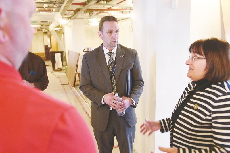 Manchester VA Medical Center Director Alfred Montoya speaks with U.S. Rep. Annie Kuster during a tour of repairs and upgrades to the Veterans Affairs Medical Center in Manchester on Friday. (THOMAS ROY/UNION LEADER)